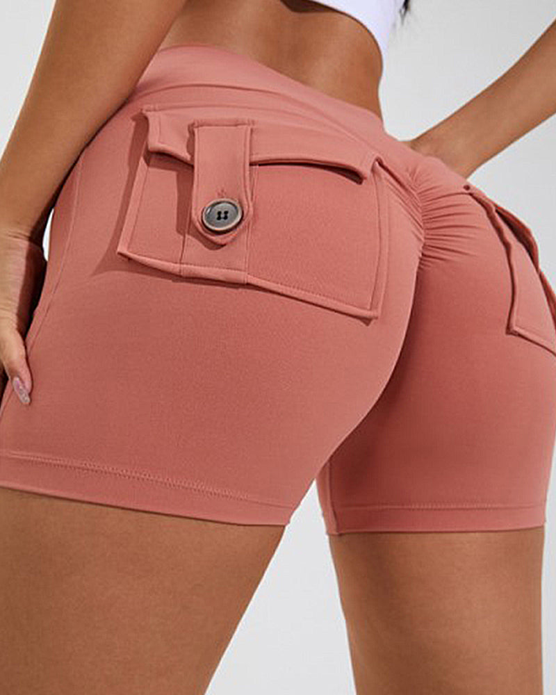 Pantalones cortos de yoga para mujer con bolsillos traseros tipo cargo y levantamiento de cadera