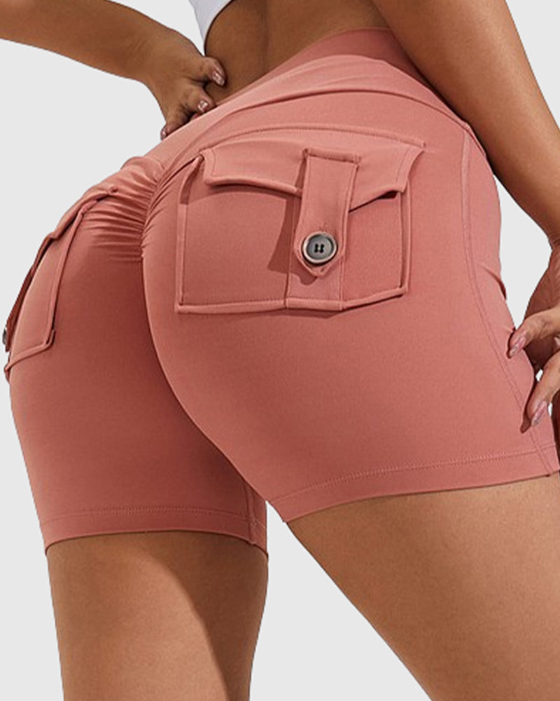 Pantalones cortos de yoga para mujer con bolsillos traseros tipo cargo y levantamiento de cadera