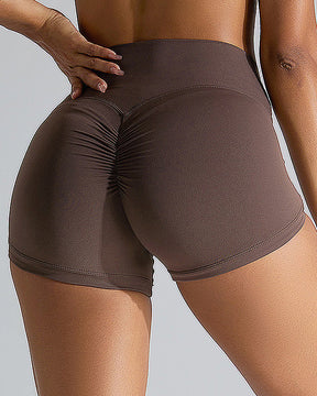 Pantalones cortos de yoga deportivos sin costuras para levantamiento de cadera