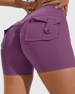 Pantalones cortos de yoga para mujer con bolsillos traseros tipo cargo y levantamiento de cadera