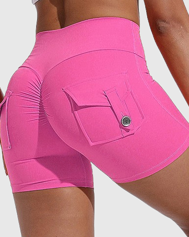 Pantalones cortos de yoga para mujer con bolsillos traseros tipo cargo y levantamiento de cadera