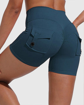 Pantalones cortos de yoga para mujer con bolsillos traseros tipo cargo y levantamiento de cadera