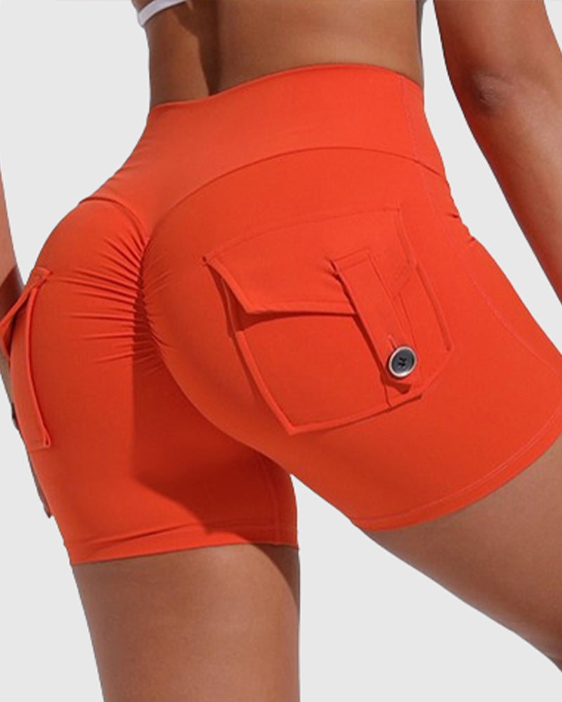 Pantalones cortos de yoga para mujer con bolsillos traseros tipo cargo y levantamiento de cadera