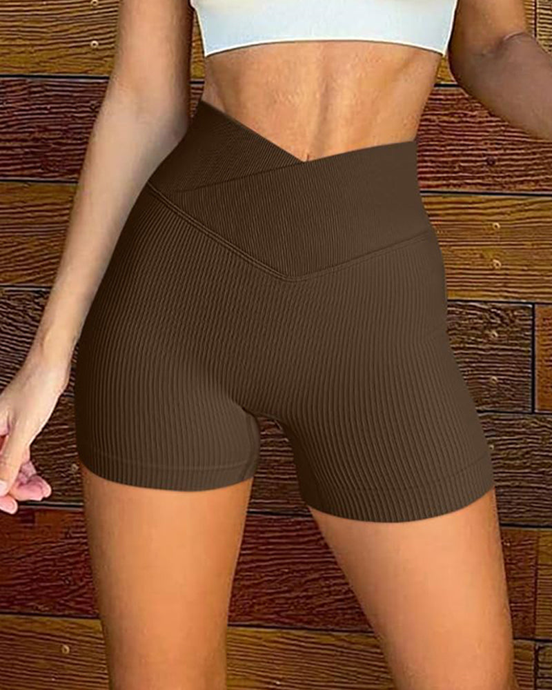 Pantalones cortos de yoga elásticos de entrenamiento con cintura en V acanalados Leggings ajustados sólidos