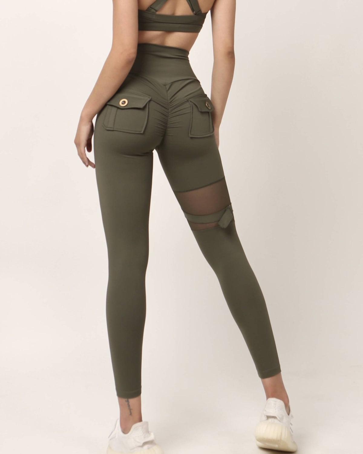 Pantalones de yoga de malla con bolsillo recortado exclusivos Leggings fruncidos