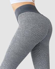 Pantalones de yoga de cintura alta con levantamiento de glúteos y anticelulíticos en forma de panal