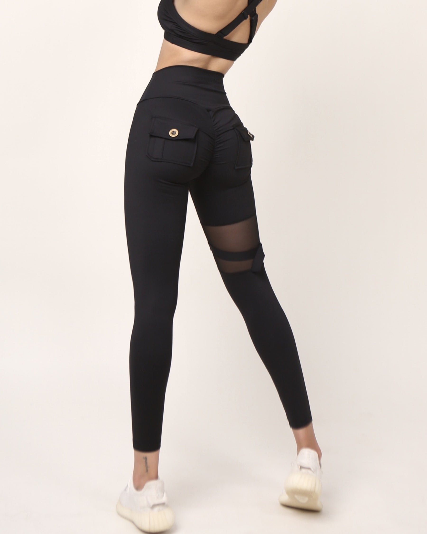 Pantalones de yoga de malla con bolsillo recortado exclusivos Leggings fruncidos