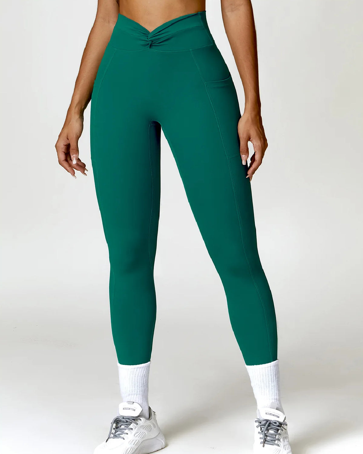 Leggings de secado rápido con levantamiento de cadera y cintura torcida con pantalones de yoga con bolsillo lateral